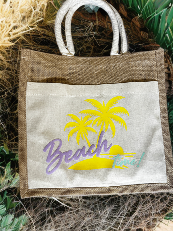 image of a beach bag for summer with the phrase beach on purple